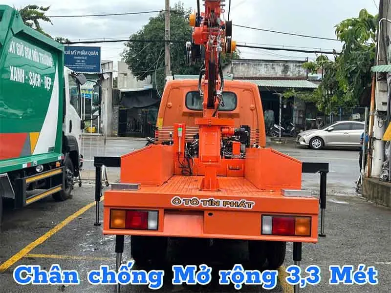 So Sánh Thang Nâng Người làm việc trên cao 12m Hangil và Genie 5 Xe thang nâng 12m màu cam trang bị 4 chân chống vững chắc