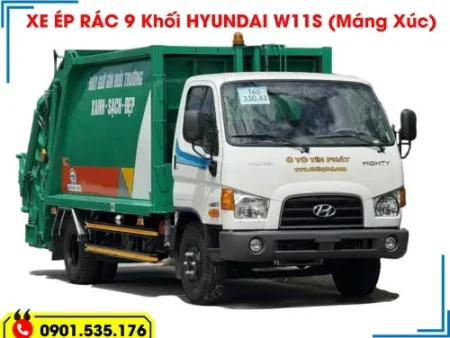 Xe ép rác 9 khối Hyundai W11S màu xanh lá cây, chụp từ góc trước, cho thấy thiết kế đầu xe mạnh mẽ và thùng ép rác lớn.