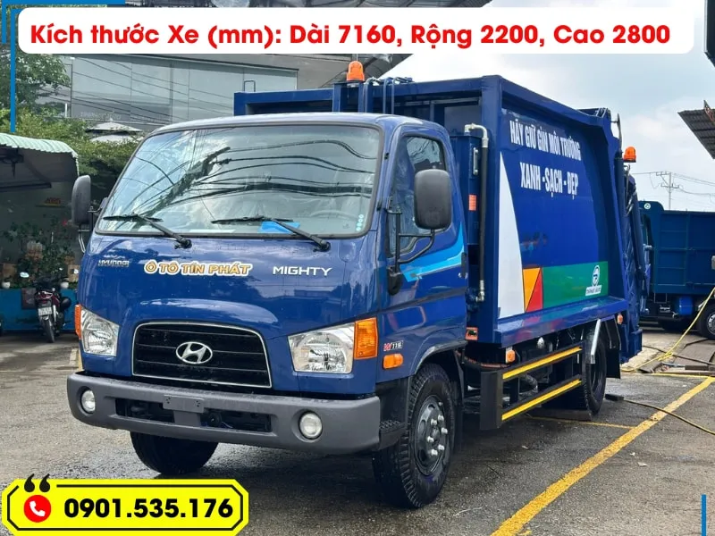 Xe Ép Rác 9 Khối Hyundai - Euro 5 (Máng Xúc) 23 Xe ép rác 9 khối Hyundai màu xanh dương, chụp từ góc chéo phía trước, với thông số kích thước tổng thể của xe (Dài 7160, Rộng 2200, Cao 2800mm).